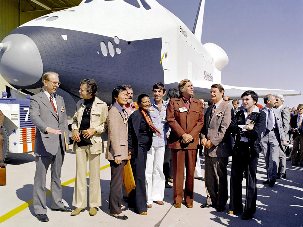 Gene and members of the Original Series cast along with NASA administrators attending Enterprise’s rollout ceremony