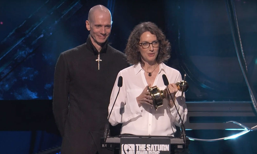Doug Jones and Michelle Paradise accept the award for Best Streaming Science Fiction Show