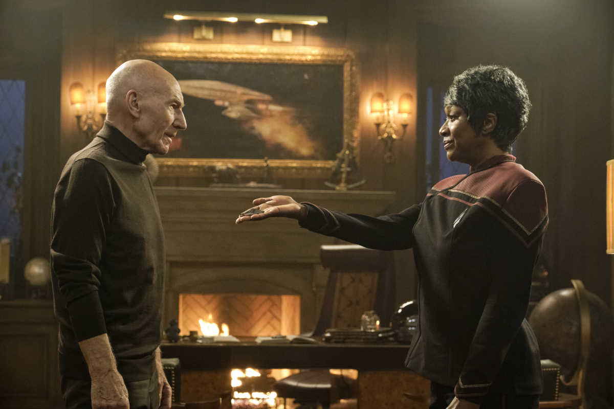 Patrick Stewart as Jean-Luc Picard and April Grace as Admiral Whitley