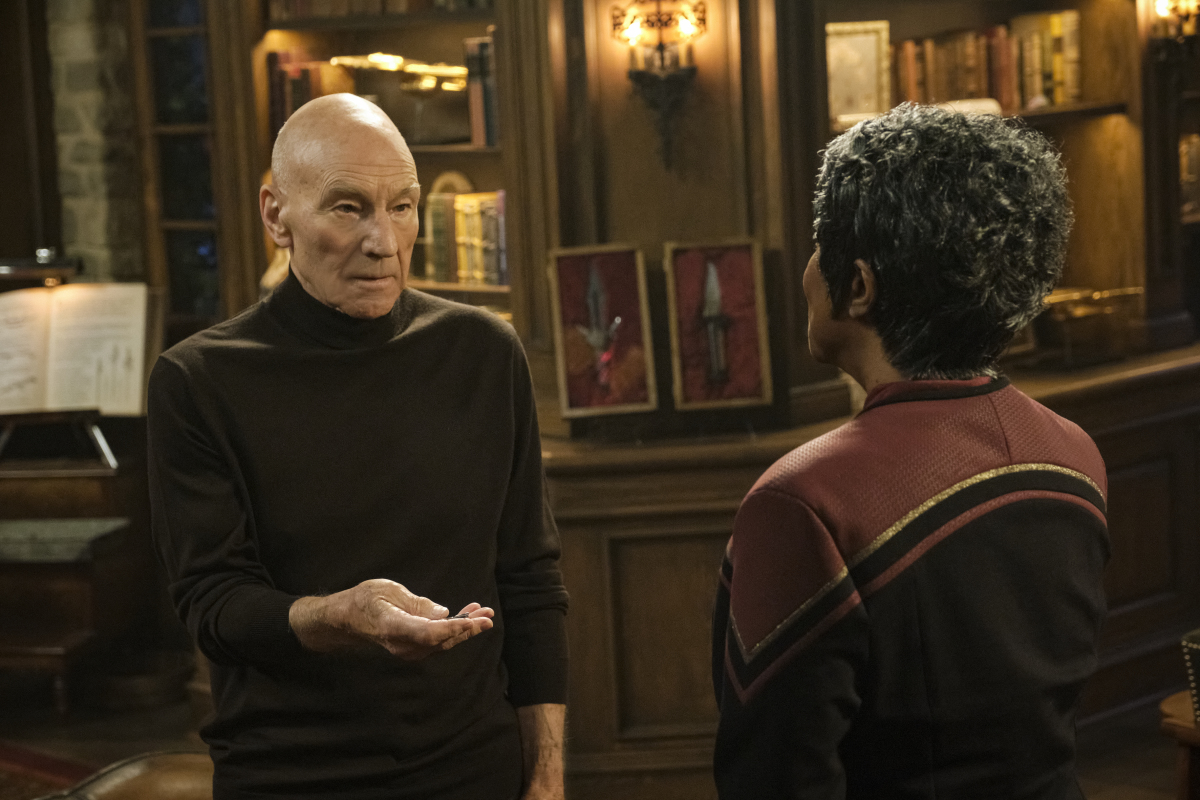 Patrick Stewart as Jean-Luc Picard and April Grace as Admiral Whitley