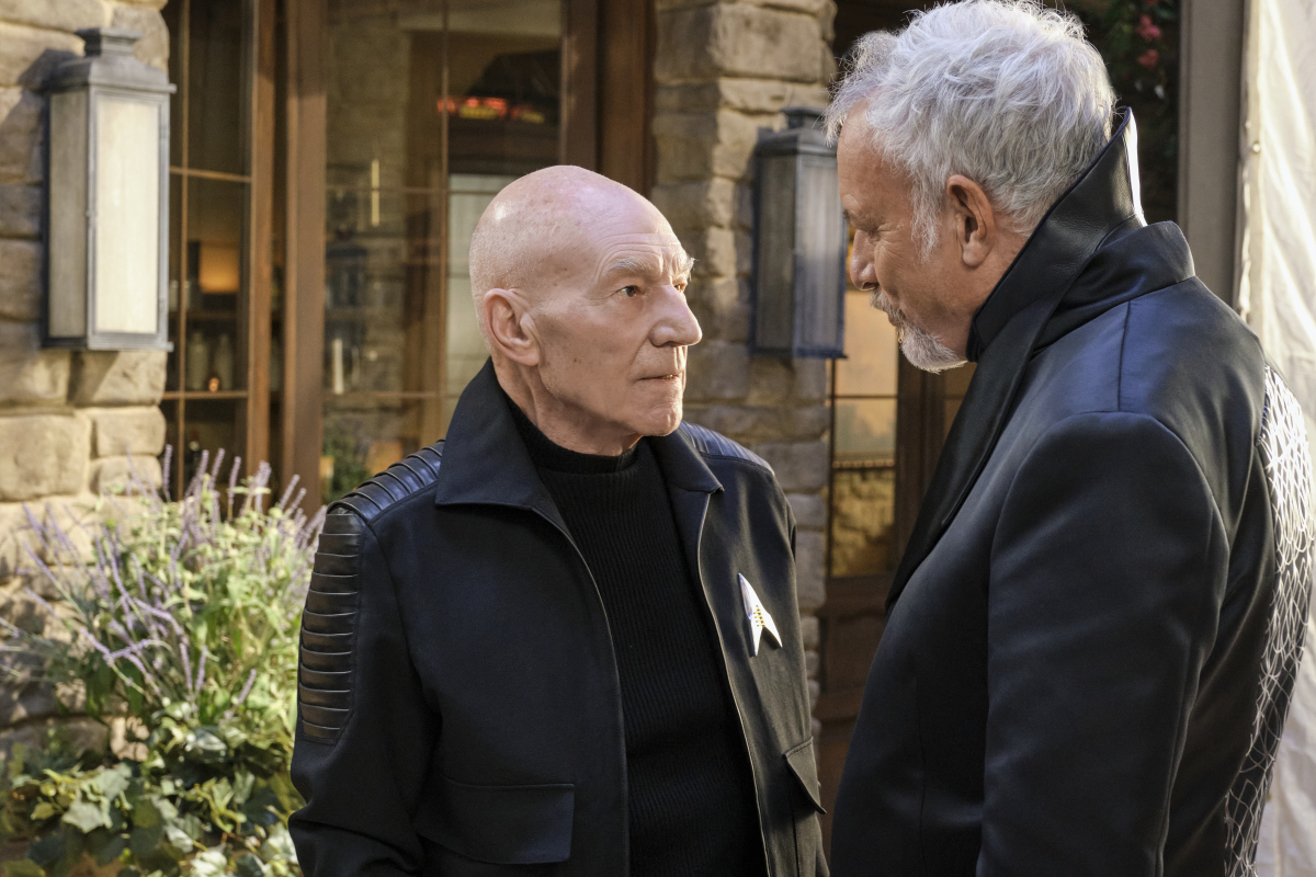 Patrick Stewart as Jean-Luc Picard and John de Lancie as Q