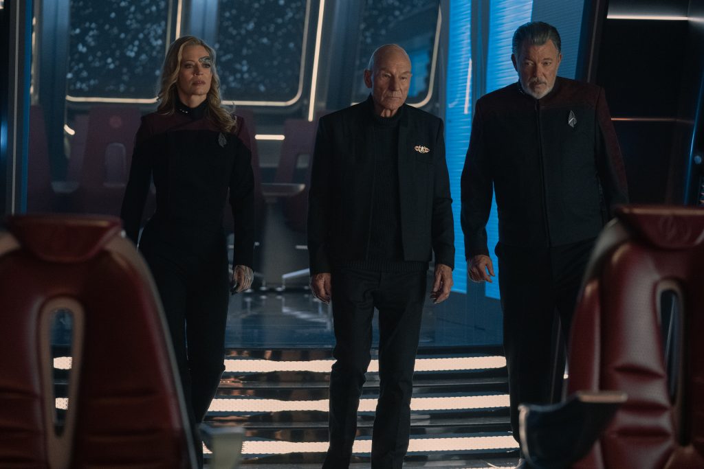 Jeri Ryan as Seven, Patrick Stewart as Picard, and Jonathan Frakes as Riker