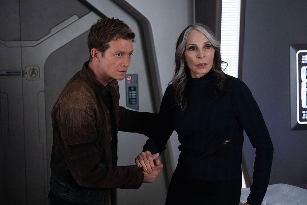 Ed Speelers as Jack Crusher and Gates McFadden as Dr. Beverly Crusher in 