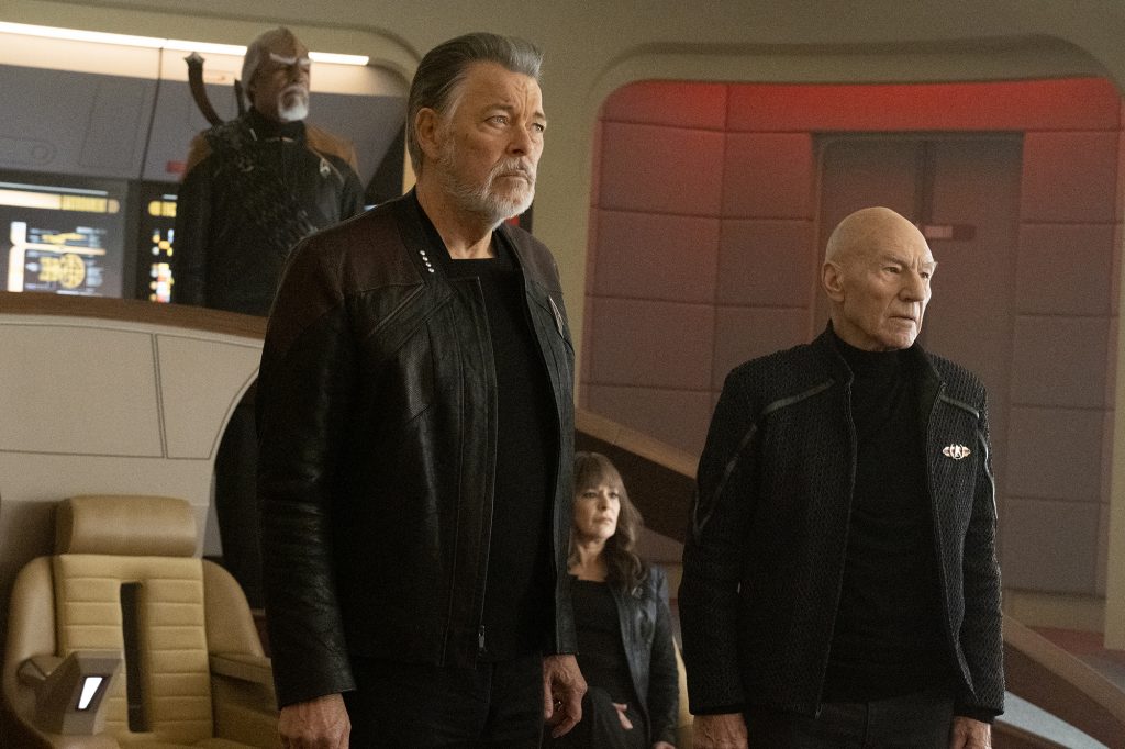 Jonathan Frakes as Will Riker, Patrick Stewart as Picard, Marina Sirtis as Deanna Troi and Michael Dorn as Worf
