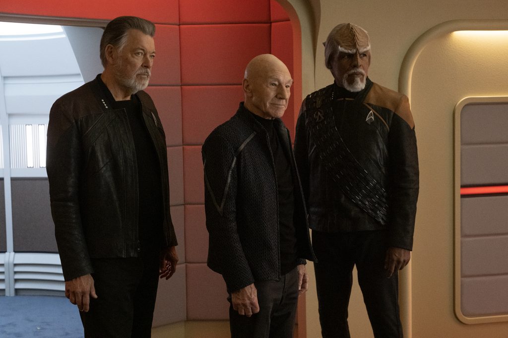 Jonathan Frakes as Will Riker, Patrick Stewart as Picard and Michael Dorn as Worf