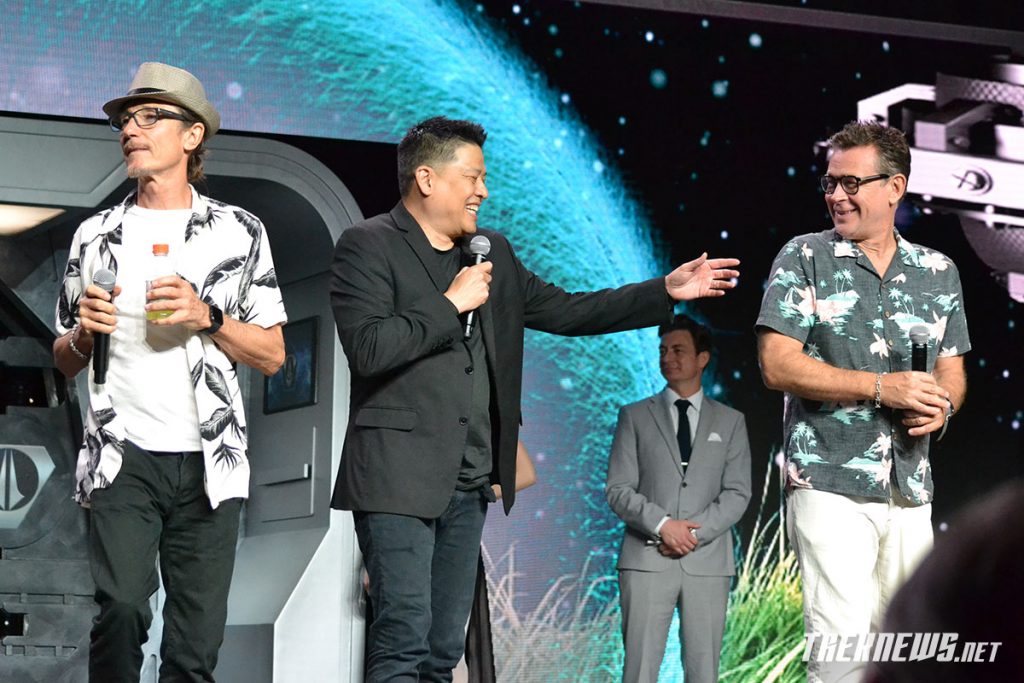 Dominic Keating, Garrett Wang and Connor Trinneer on stage in 2022