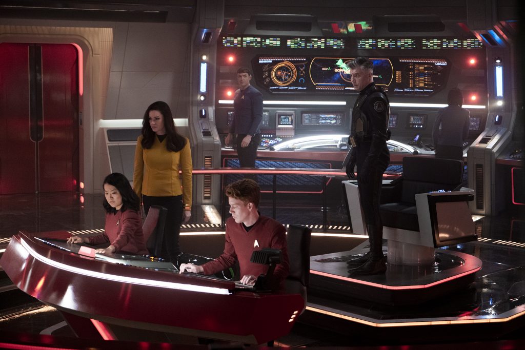 Rong Fu as Mitchell, Rebecca Romijn as Una, Ethan Peck as Spock and Anson Mount as Capt. Pike